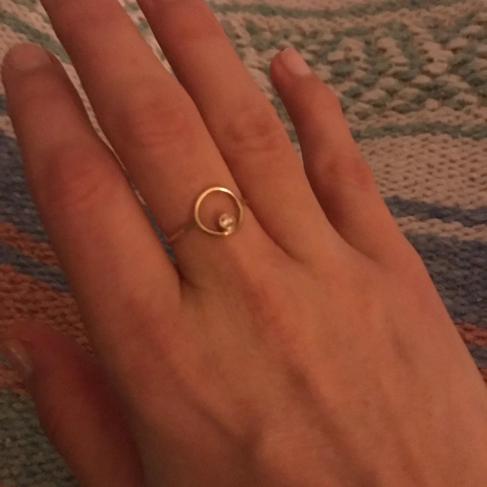 Elegant Gold Ring with Diamond Accent